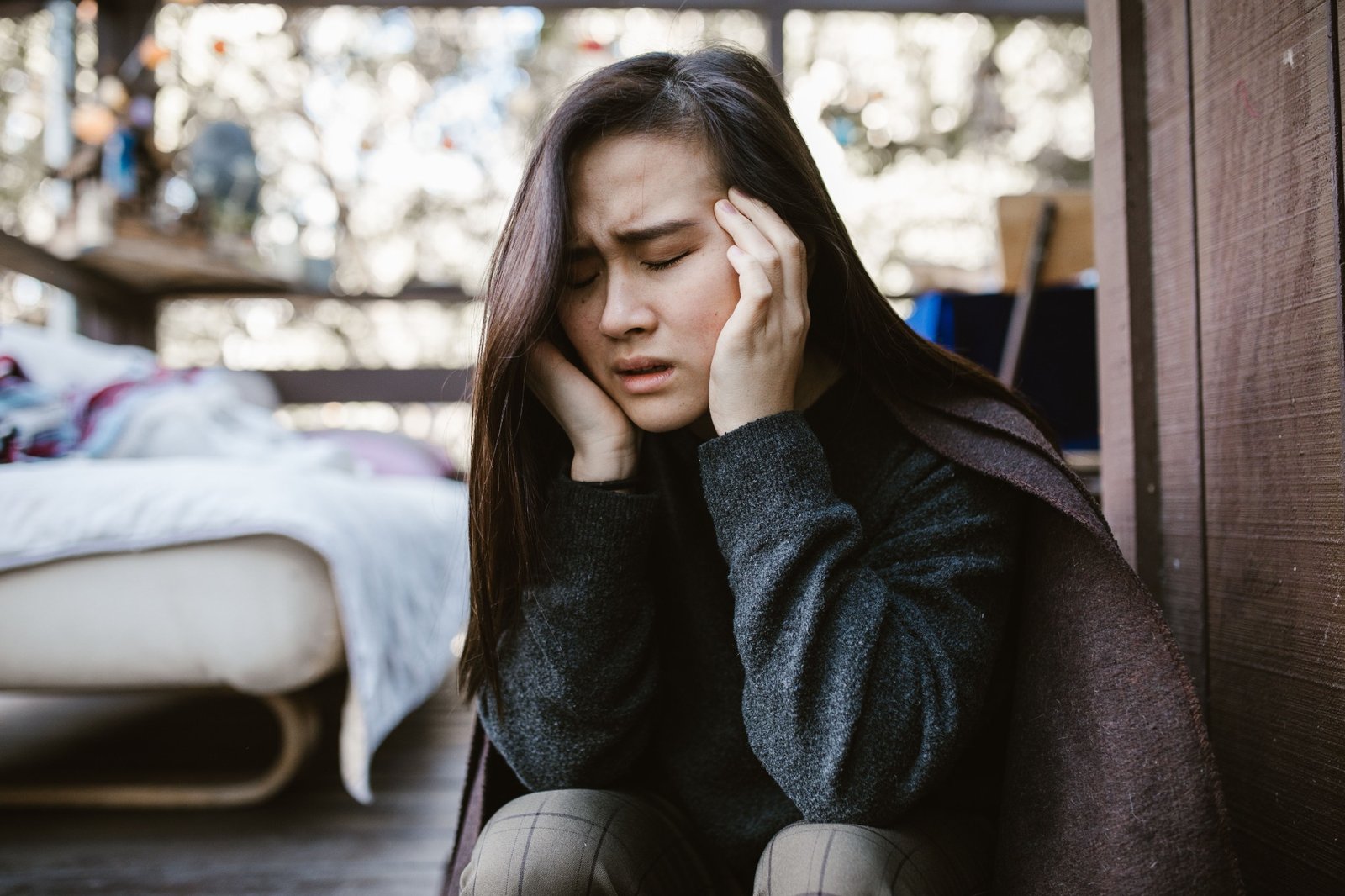 Patient experiencing headache and neck tension