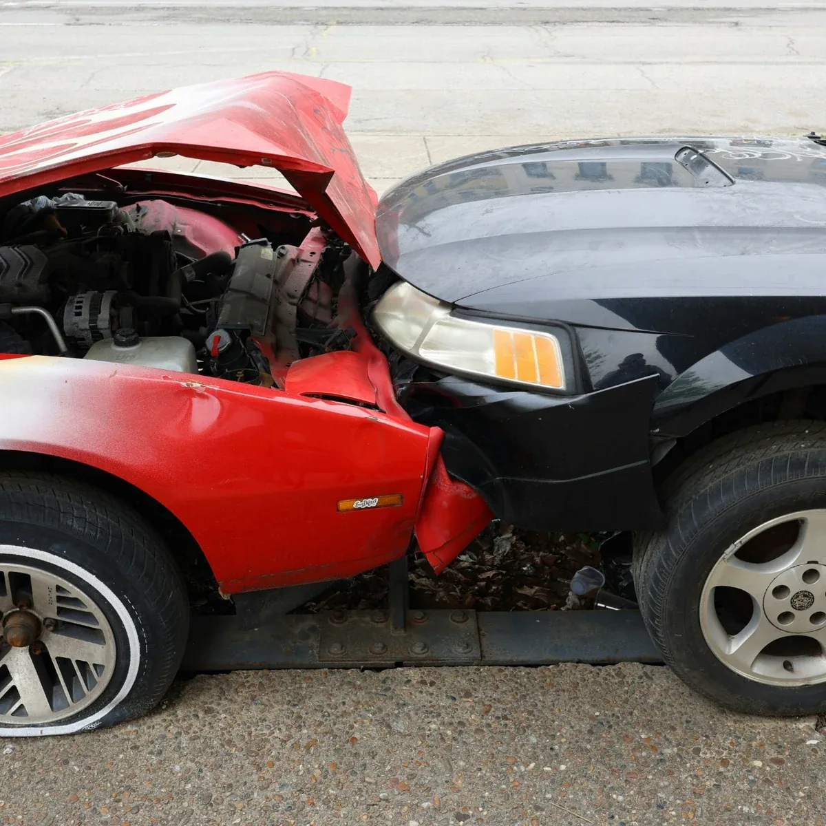 Two damaged vehicles after an auto accident